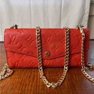 Louis Vuitton Orange Monogram Empreinte Curieuse mini bag